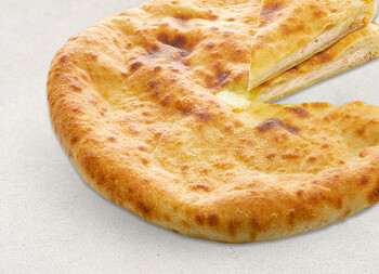 Осетинский пирог с ветчиной и сыром